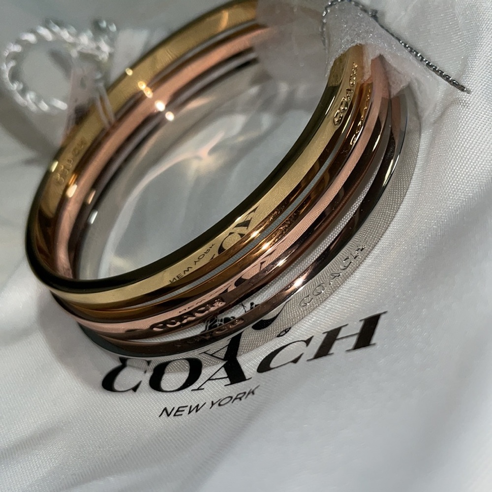 Coach 3 piece tri-color bracelet set